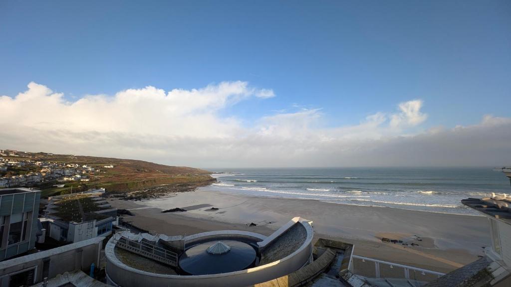 The balcony at Tate Five looking out over St Ives and the sea